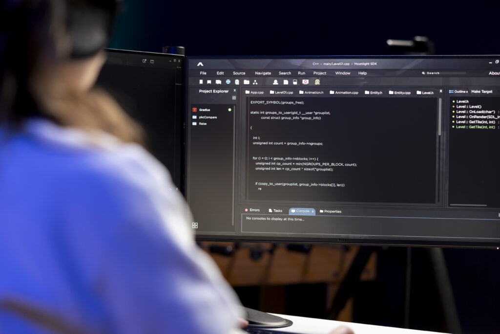 Freelancing developer hearing audiobooks while designing and developing software applications. IT expert enjoying podcasts while implementing and maintaining company systems