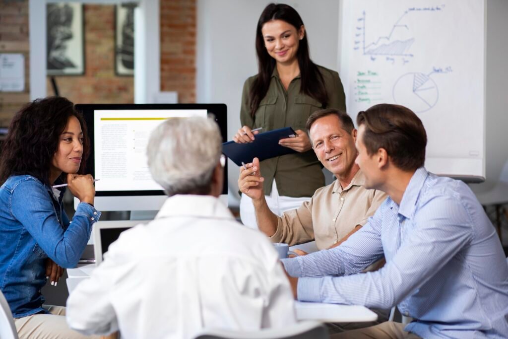 people-using-digital-device-while-meeting